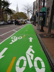 Color-Safe_Roads_green bike lane nyc mma material